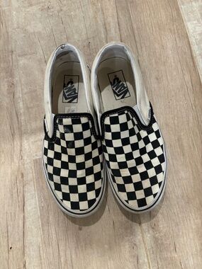 Vans Black & White Checkerboard Slip-On Sneakers